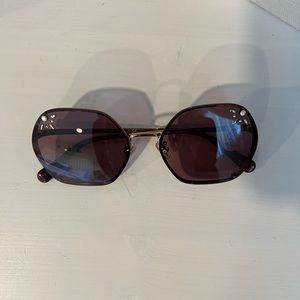 Purple Coach sunglasses
